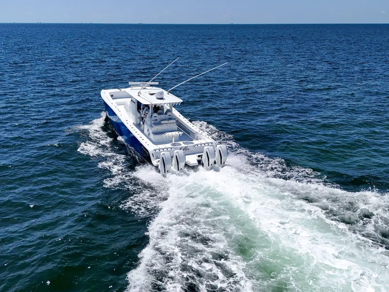 Slide: The Image of A 2023 Freeman 47 boat cruising on open ocean waters. - 24