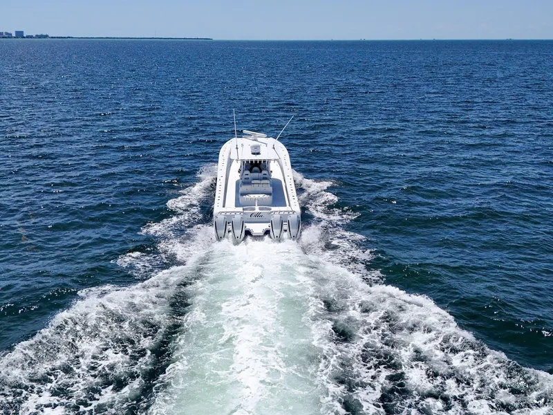 Slide: The Image of Freeman 47 boat cruising on open sea, 2023 model, aerial view. - 25