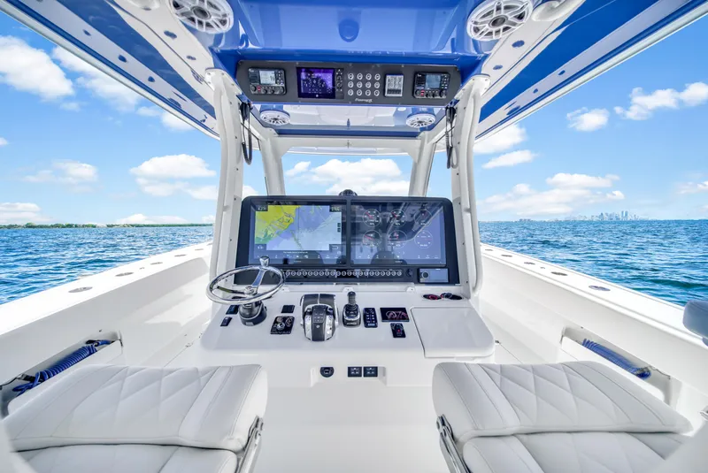 Slide: The Image of Cockpit of 2023 Freeman 47 boat with advanced navigation system on open sea. - 41