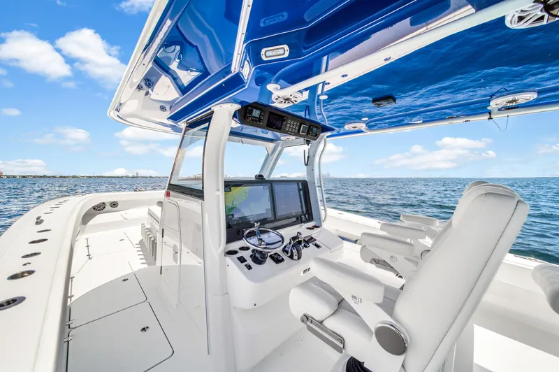 Slide: The Image of 2023 Freeman 47 boat interior with modern navigation system on open water. - 43