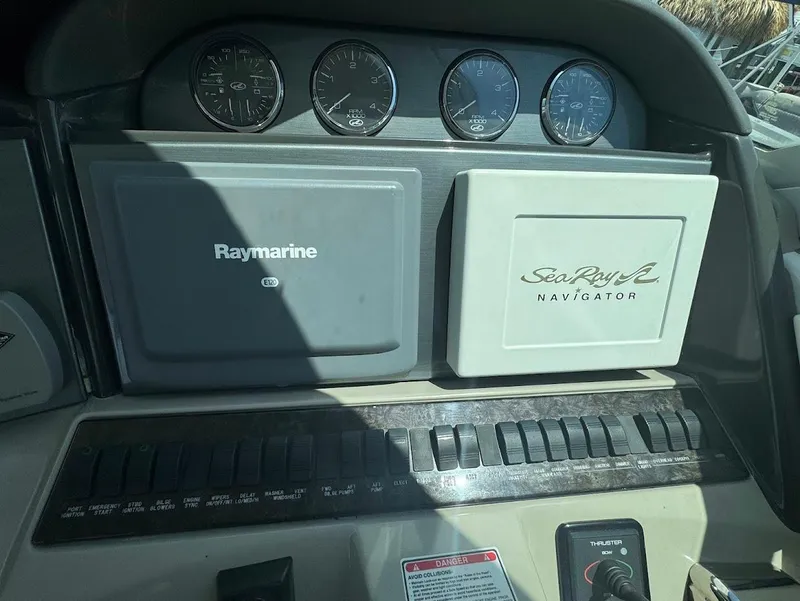 Slide: The Image of Control panel of a 2006 Sea Ray 40 Motor Yacht with Raymarine and Sea Ray Navigator systems. - 16