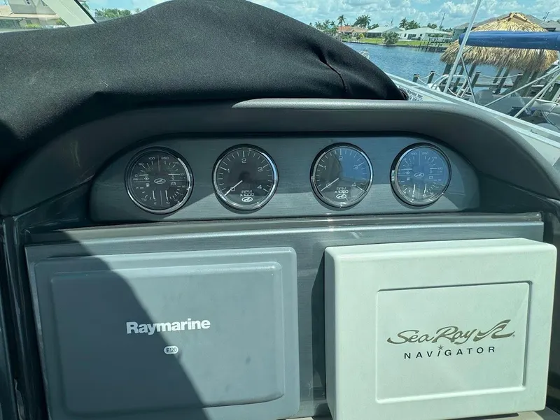 Slide: The Image of Control panel of a 2006 Sea Ray 40 Motor Yacht with Raymarine and Sea Ray Navigator systems. - 17