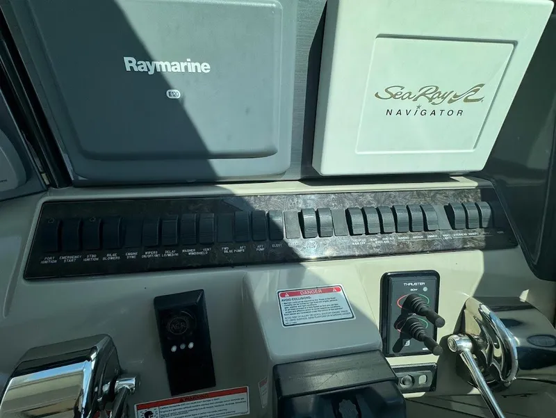 Slide: The Image of 2006 Sea Ray 40 Motor Yacht dashboard with Raymarine and Sea Ray Navigator systems. - 18