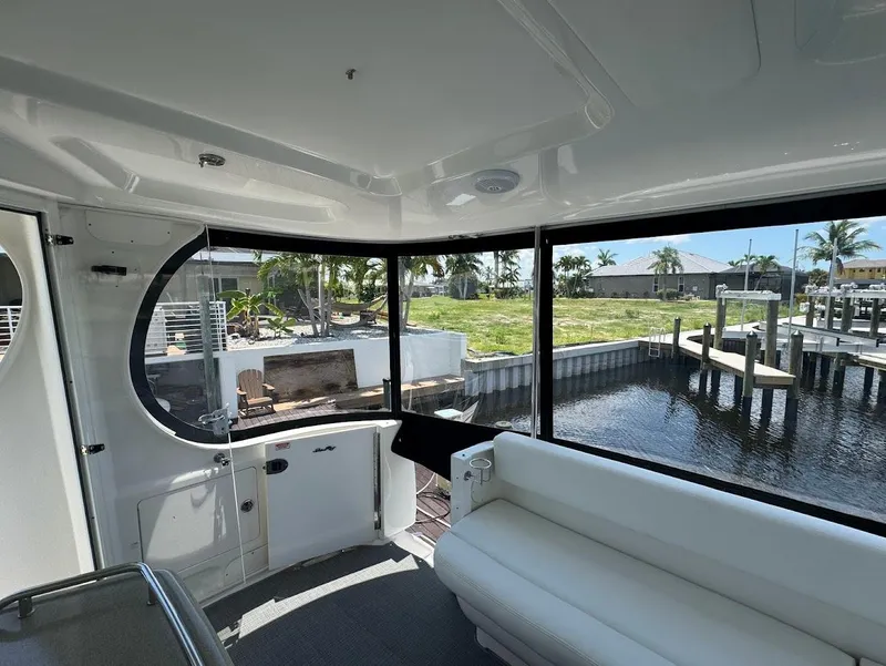 Slide: The Image of Interior view of 2006 Sea Ray 40 Motor Yacht with waterfront scenery. - 9