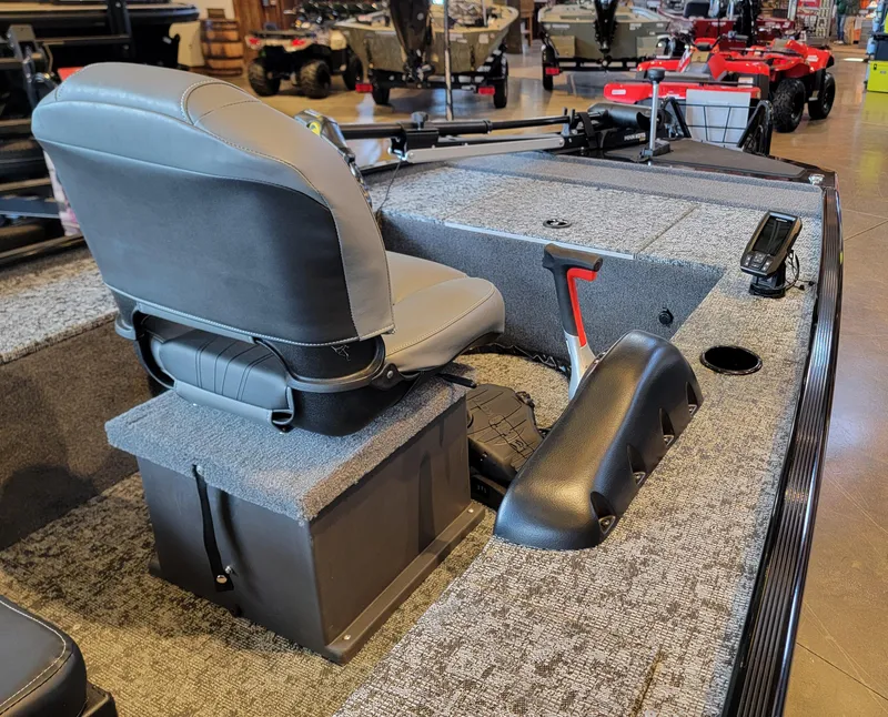 Slide: The Image of 2025 Tracker Panfish 17 boat interior with seating and fishing equipment. - 4