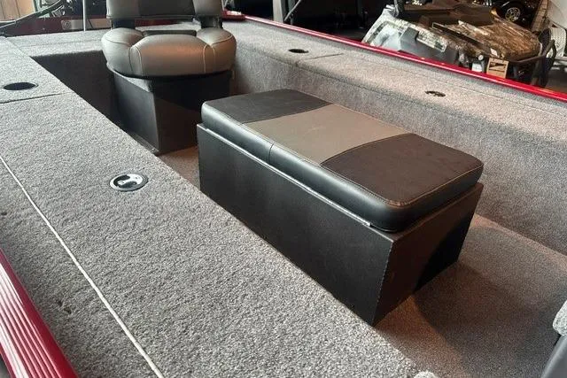 Slide: The Image of 2025 Tracker Panfish 17 boat interior with seating and storage, featuring gray and black upholstery. - 10
