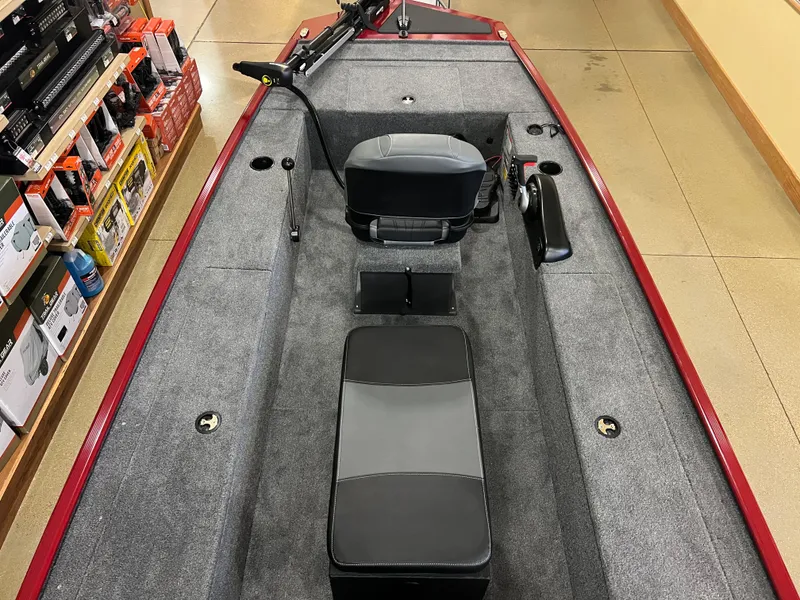 Slide: The Image of 2025 Tracker Panfish 17 boat interior with seating and storage compartments. - 3