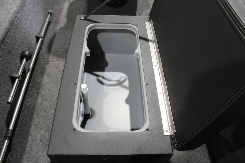 Slide: The Image of 2025 Tracker Panfish 17 livewell compartment with open lid, showcasing interior design. - 16