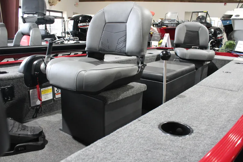Slide: The Image of 2025 Tracker Panfish 17 boat interior with gray seating and carpeted flooring. - 8