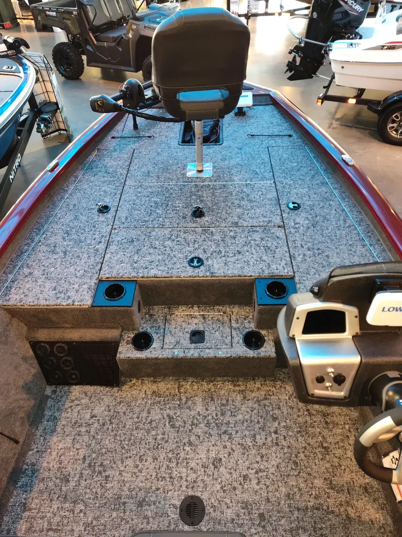 Slide: The Image of 2025 Tracker Panfish 17 boat interior with seating and control panel. - 5