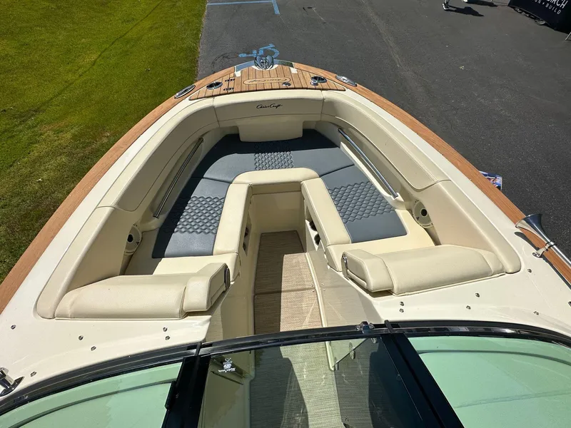 Slide: The Image of 2023 Chris-Craft Launch 25 GT boat interior with luxurious seating and elegant design. - 8