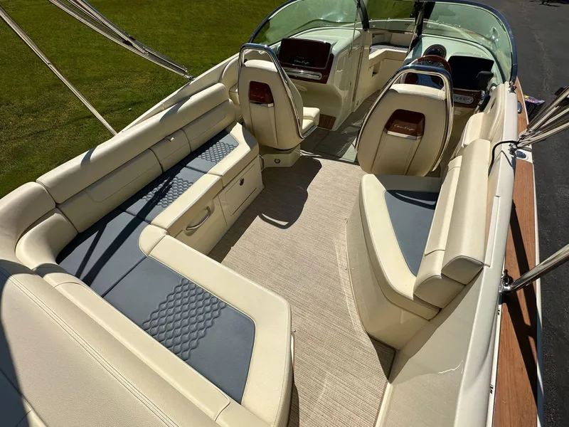Slide: The Image of 2023 Chris-Craft Launch 25 GT interior with luxurious seating and elegant design. - 9