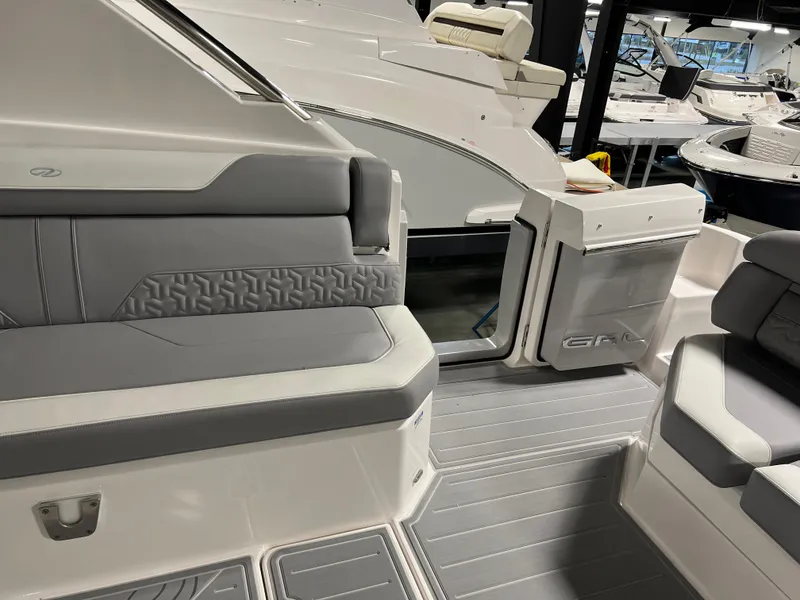 Slide: The Image of 2025 Regal LS36 boat interior with sleek gray seating and modern design. - 6