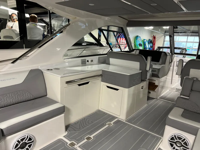 Slide: The Image of Luxurious interior of 2025 Regal LS36 boat with modern seating and sleek design. - 9
