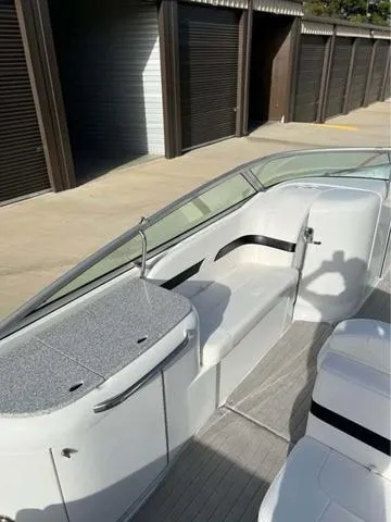 Slide: The Image of 2008 Formula 260 Bow Rider boat interior with seating and storage compartments. - 16