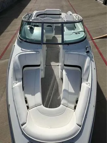 Slide: The Image of 2008 Formula 260 Bow Rider boat with spacious seating and sleek design. - 6