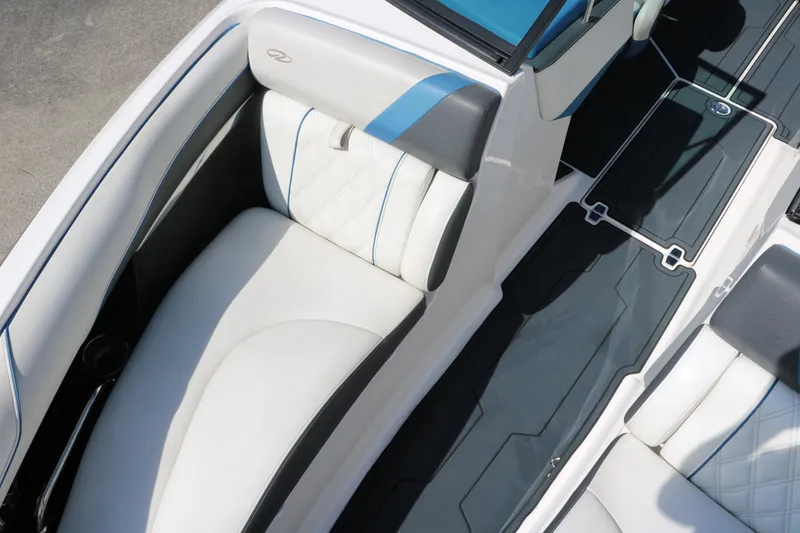 Slide: The Image of 2018 Regal 23 RX Surf boat interior with white and blue seating. - 30