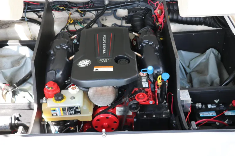 Slide: The Image of Engine compartment of a 2018 Regal 23 RX Surf boat, featuring a Volvo Penta engine. - 39