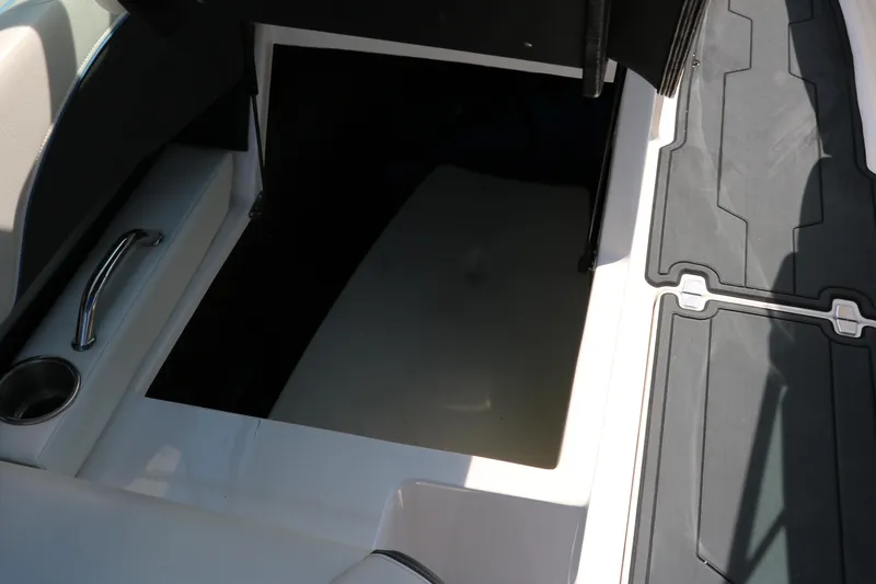 Slide: The Image of 2018 Regal 23 RX Surf boat interior storage compartment with sleek design and modern features. - 45
