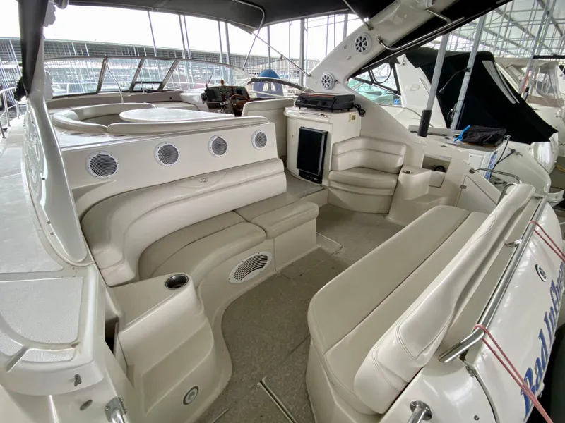 Slide: The Image of 2001 Regal Commodore 4160 yacht interior with spacious seating and modern amenities. - 16