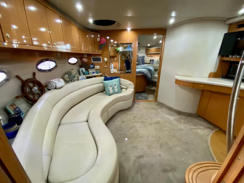 Slide: The Image of Luxurious interior of 2001 Regal Commodore 4160 yacht with plush seating and elegant decor. - 30