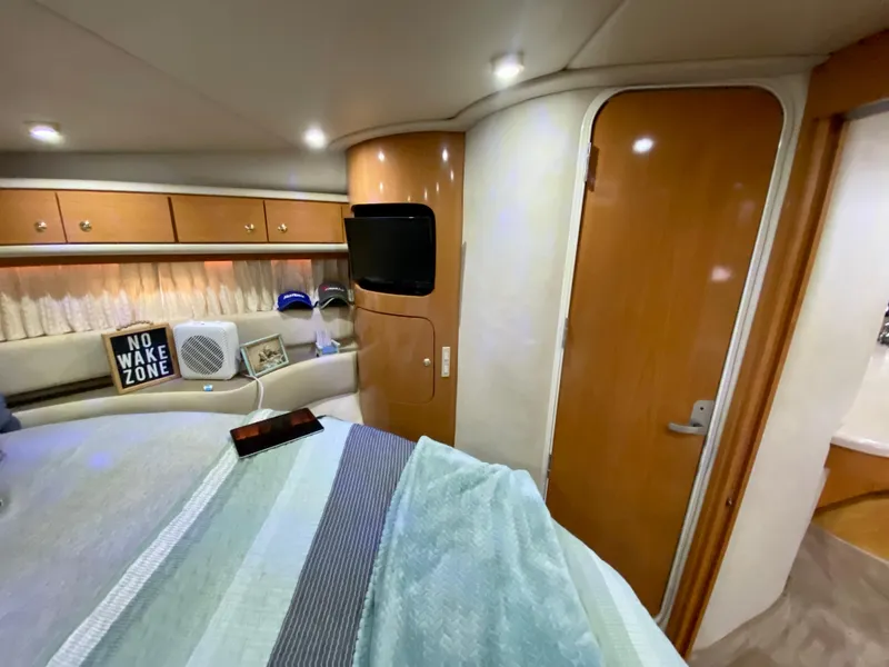 Slide: The Image of Interior of 2001 Regal Commodore 4160 yacht with cozy cabin and modern amenities. - 32