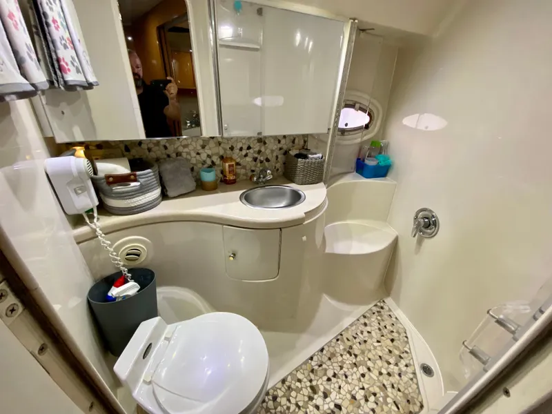 Slide: The Image of Luxurious bathroom in 2001 Regal Commodore 4160 yacht with modern amenities and stylish design. - 33
