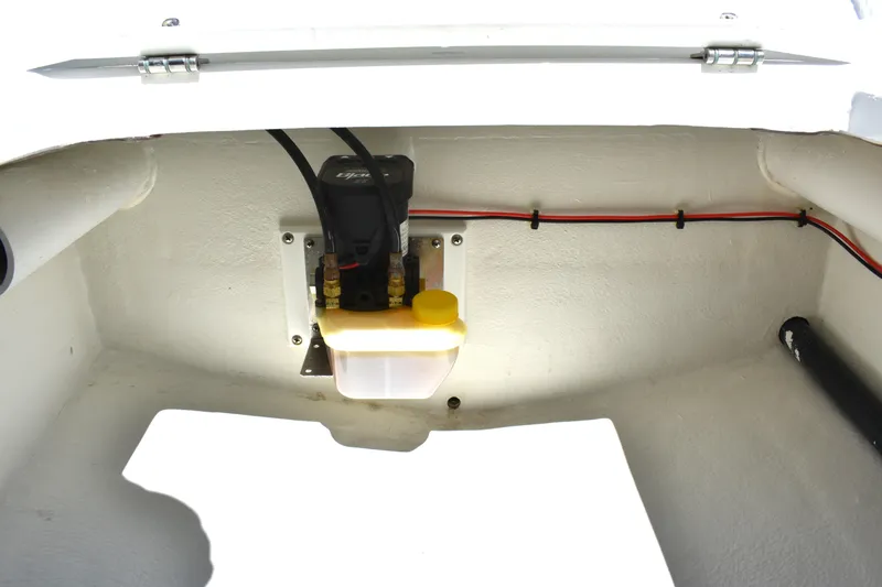 Slide: The Image of 2023 Pair Customs 24 Center Console MV boat interior wiring and components. - 30