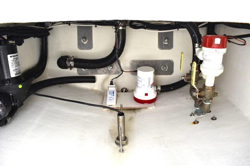 Slide: The Image of 2023 Pair Customs 24 Center Console MV boat interior wiring and components view. - 31