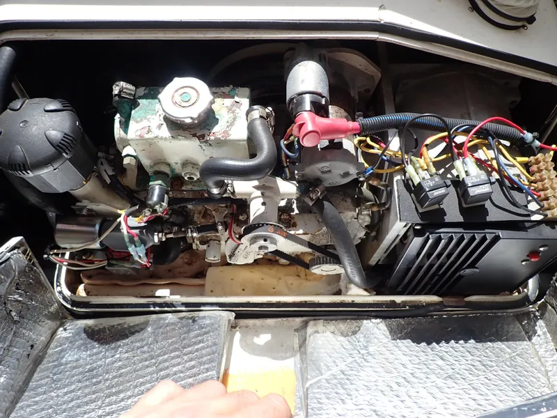 Slide: The Image of Engine compartment of a 2004 Mainship 34 Rum Runner II boat. - 45