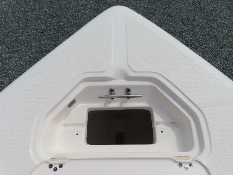 Slide: The Image of 2019 Key West 176 Center Console boat bow storage compartment. - 11