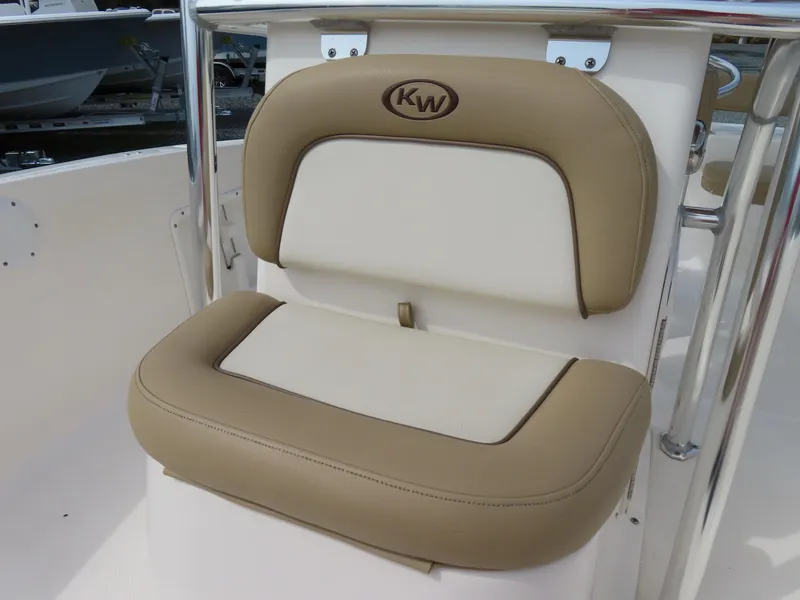 Slide: The Image of 2019 Key West 176 Center Console boat seat with beige and white upholstery. - 15