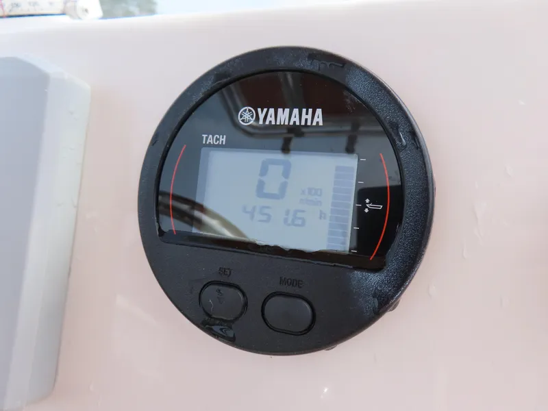 Slide: The Image of Yamaha tachometer on 2019 Key West 176 Center Console boat dashboard. - 22