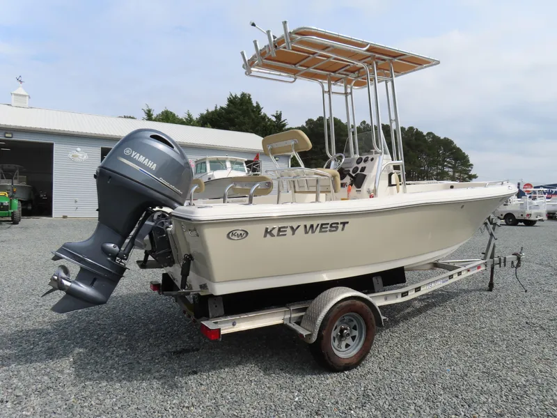 Slide: The Image of 2019 Key West 176 Center Console boat on trailer with Yamaha outboard motor. - 3