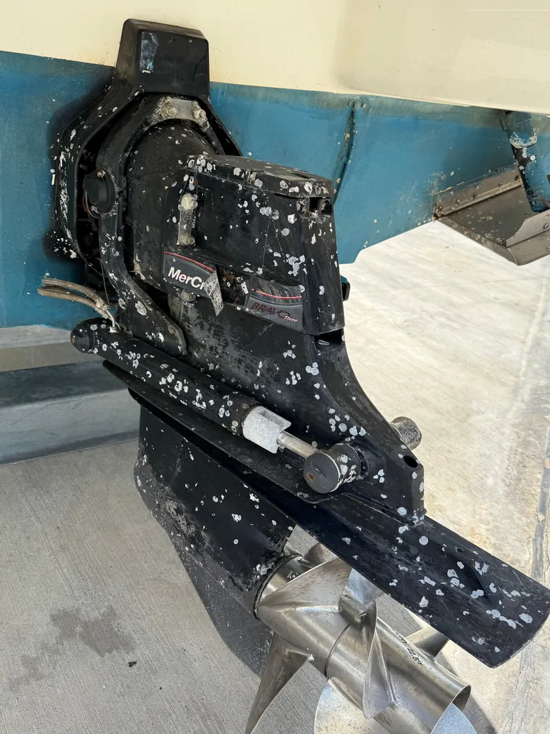 Slide: The Image of 2014 Sea Ray 270 SLX boat propeller with barnacles, showcasing marine wear. - 10