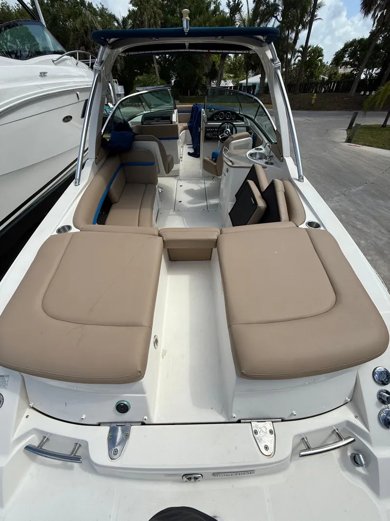 Slide: The Image of 2014 Sea Ray 270 SLX boat with beige seating and sleek design. - 6