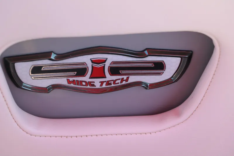 Slide: The Image of 2016 Chaparral 246 SSi Wide Tech logo on a boat interior. - 34