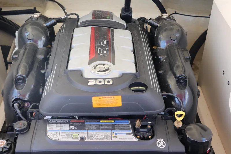 Slide: The Image of 2016 Chaparral 246 SSi boat engine, featuring a powerful 6.2L Mercury 300 horsepower motor. - 43