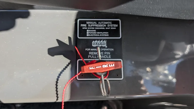 Slide: The Image of 2015 MasterCraft X10 fire suppression system with manual operation pull handle. - 15