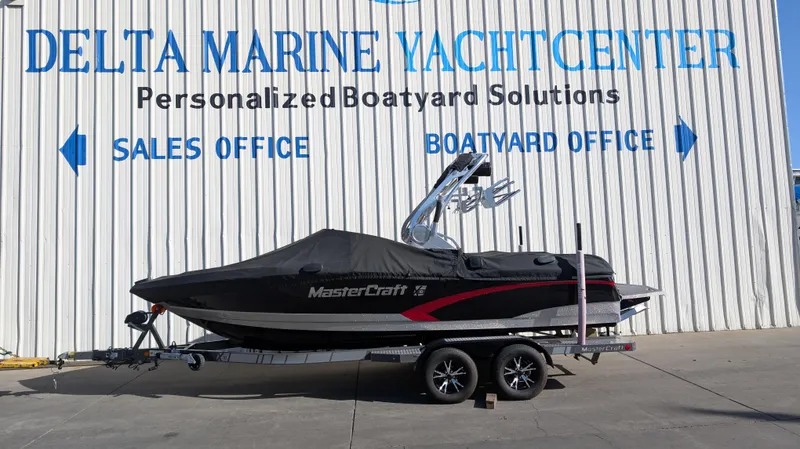 Slide: The Image of 2015 MasterCraft X10 boat on trailer at Delta Marine Yacht Center. - 32