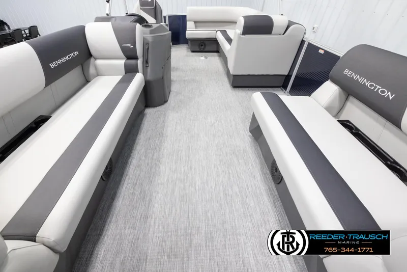 Slide: The Image of 2025 Bennington 20 SLSE pontoon boat interior with gray seating and flooring. - 13