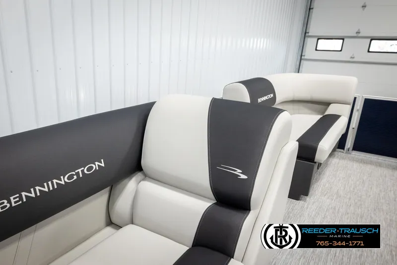 Slide: The Image of 2025 Bennington 20 SLSE boat interior with sleek, modern seating design. - 21