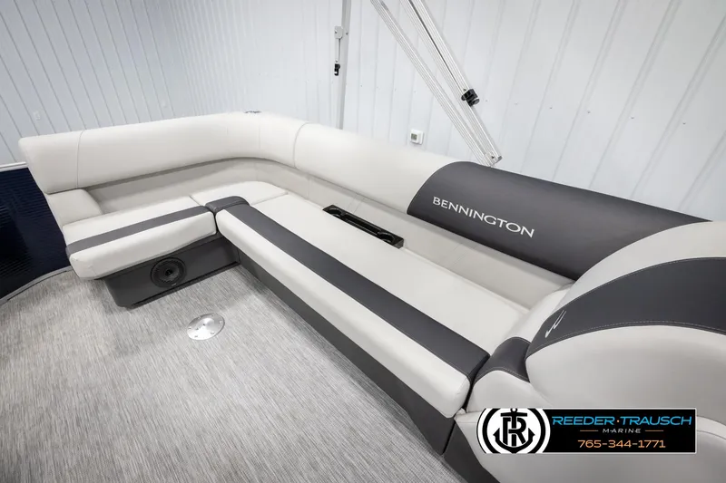 Slide: The Image of 2025 Bennington 20 SLSE pontoon boat interior with sleek gray seating and modern design. - 23