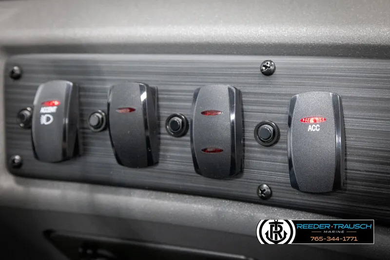 Slide: The Image of Control panel of 2025 Bennington 20 SLSE boat with labeled switches. - 33