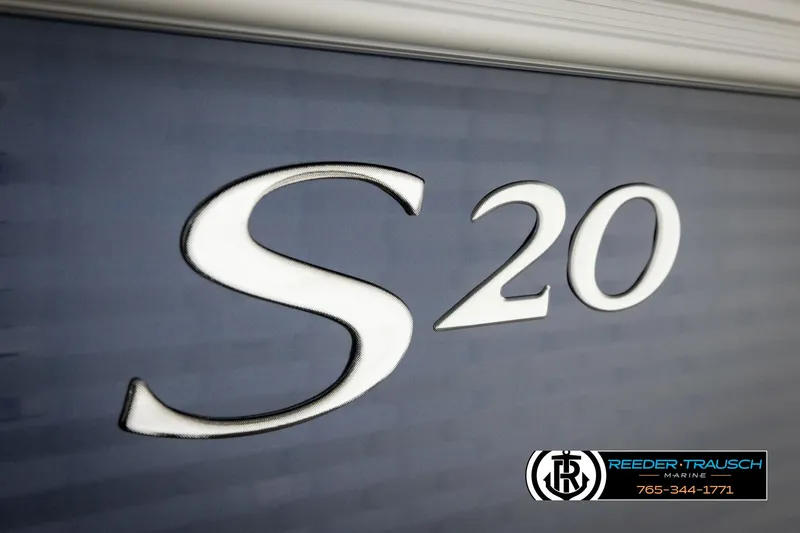 Slide: The Image of 2025 Bennington 20 SLSE boat logo on blue background with dealership branding. - 43