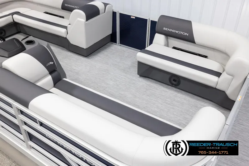 Slide: The Image of 2025 Bennington 20 SLSE pontoon boat interior with gray and white seating. - 9