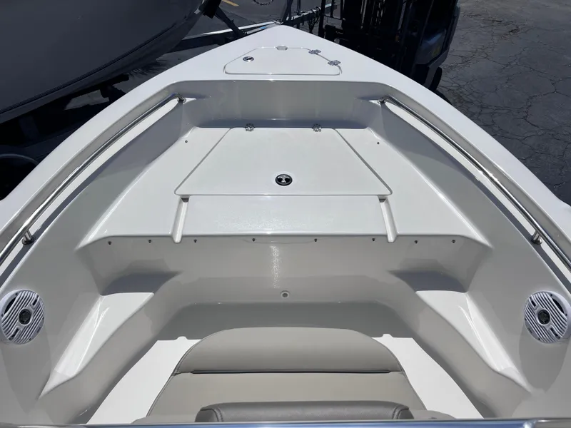 Slide: The Image of 2024 Key West 189 FS boat interior, featuring spacious seating and storage compartments. - 10