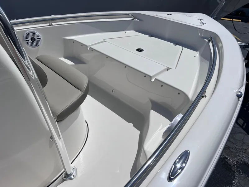 Slide: The Image of 2024 Key West 189 FS boat interior with seating and storage area. - 11
