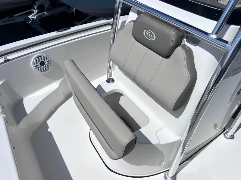 Slide: The Image of 2024 Key West 189 FS boat seating area with gray cushions and stainless steel frame. - 14