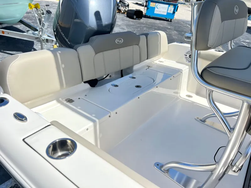 Slide: The Image of 2024 Key West 189 FS boat interior with seating and storage compartments. - 26